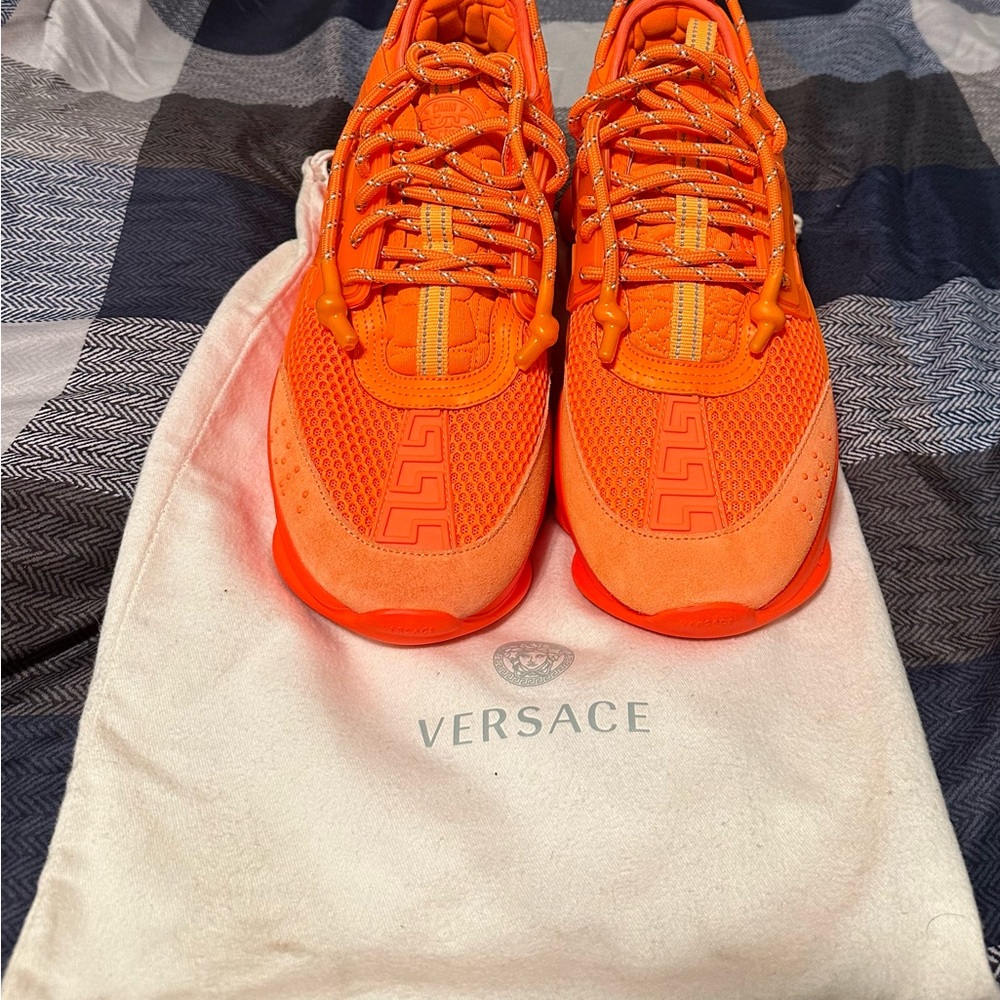 Selling a pair of never worn Versace running shoes, size 8.5 men.